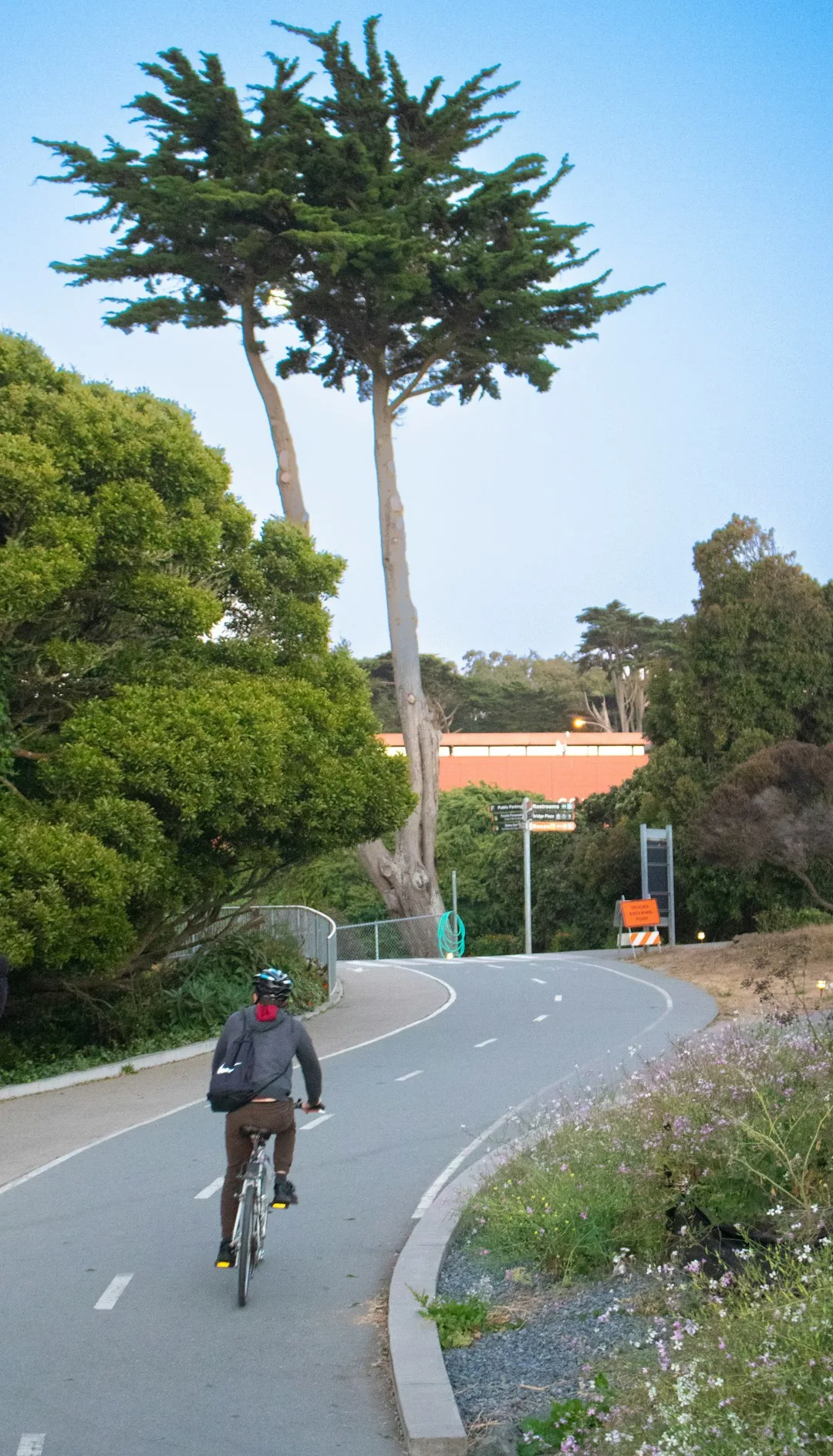 Man cycling on an outdoor trail tracked with Kyool fitness accountability